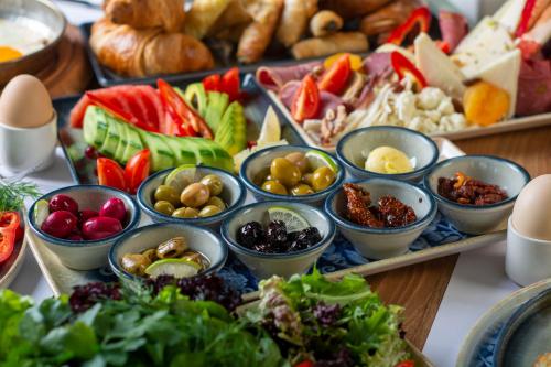 a buffet of different types of food on a table at Porto Amore Club Hotel in Alanya