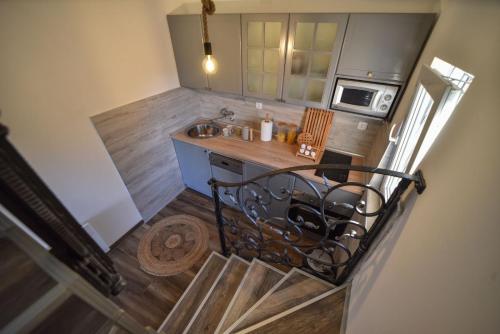 an overhead view of a kitchen with a counter top at Vila Čarna Zlatibor in Zlatibor