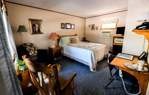 Katil atau katil-katil dalam bilik di The Pines Country Inn