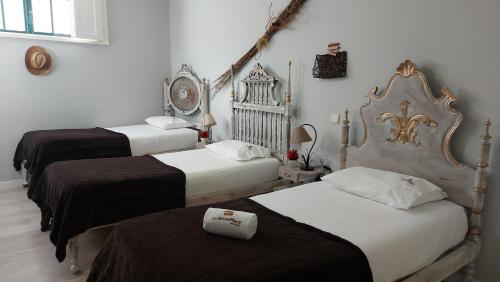 Postel nebo postele na pokoji v ubytování MyRiverPlace River View Porto apartments