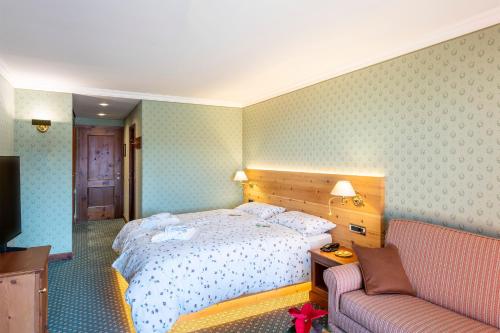 Ένα ή περισσότερα κρεβάτια σε δωμάτιο στο Hotel Sochers Club