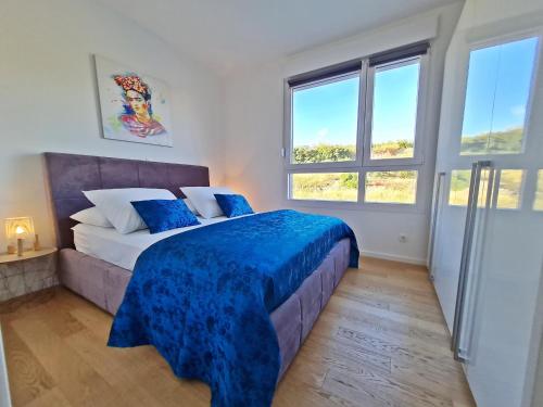 Posteľ alebo postele v izbe v ubytovaní Apartment StellaMare