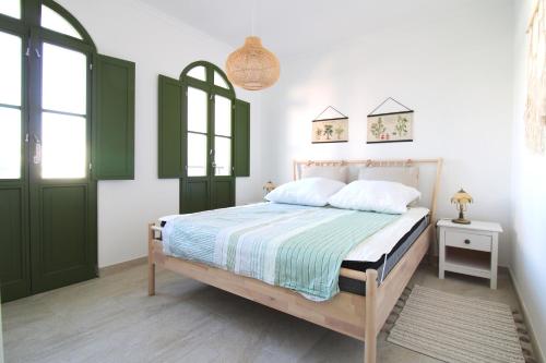 Postel nebo postele na pokoji v ubytování Casa Frajo