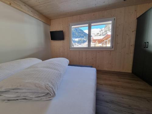 Postel nebo postele na pokoji v ubytování Haus Wally