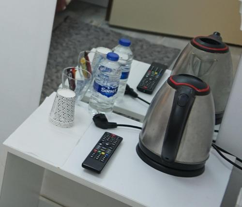 A kitchen or kitchenette at TRIO Suite Yenikapı