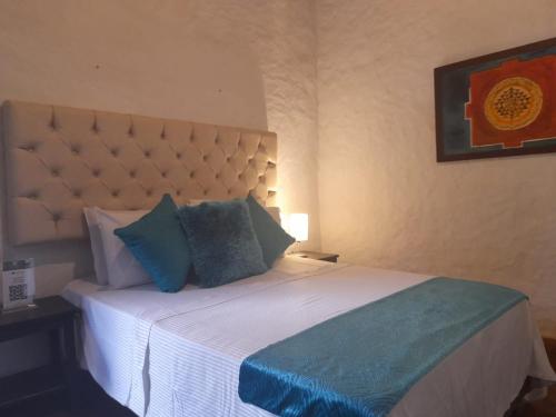Posteľ alebo postele v izbe v ubytovaní Hotel Y Spa Santos De Piedra