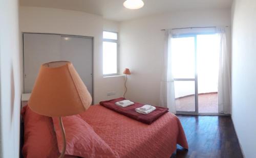 Кровать или кровати в номере ALQT Dpto 2 dormitorio SL