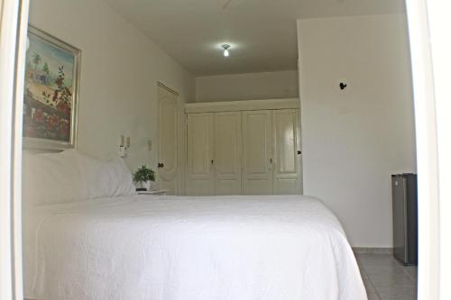 Ένα ή περισσότερα κρεβάτια σε δωμάτιο στο Sweet Home Punta Cana Guest House - VILLA Q15A