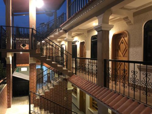 a row of stairs in a house at night at Posada don Miguel in Panajachel