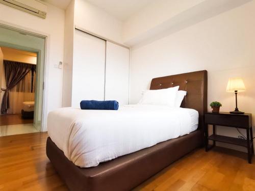 Katil atau katil-katil dalam bilik di Iskandar Residences 3 Bedroom