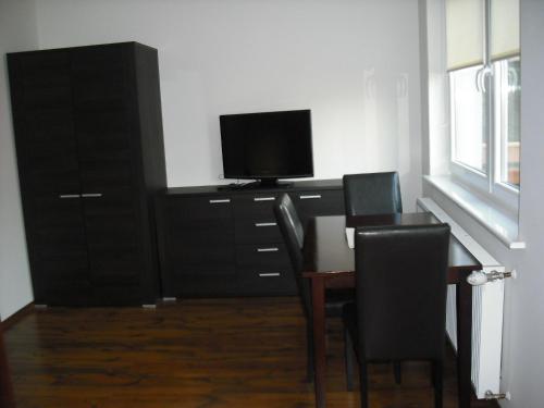 TV a/nebo společenská místnost v ubytování Pokoje w Apartamencie Danuta