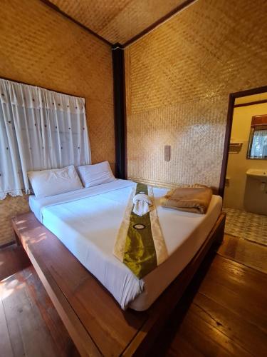 Postel nebo postele na pokoji v ubytování Ever Green Guest House - SHA Plus