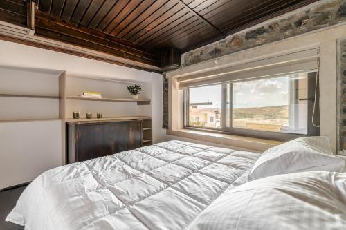 Ένα ή περισσότερα κρεβάτια σε δωμάτιο στο Villa Erini