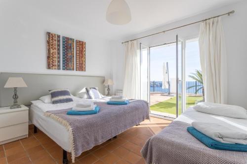 Posteľ alebo postele v izbe v ubytovaní Five Star Villa with Heavenly Views