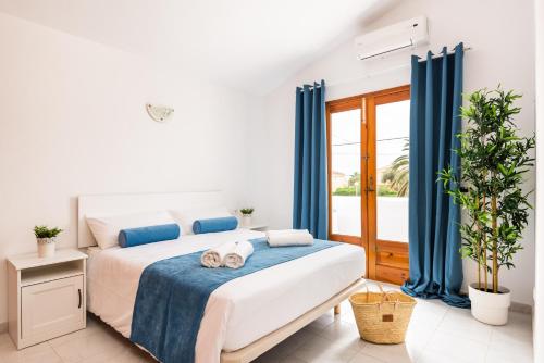 Postel nebo postele na pokoji v ubytování Apartamento Las Palmeras by Mauter Villas