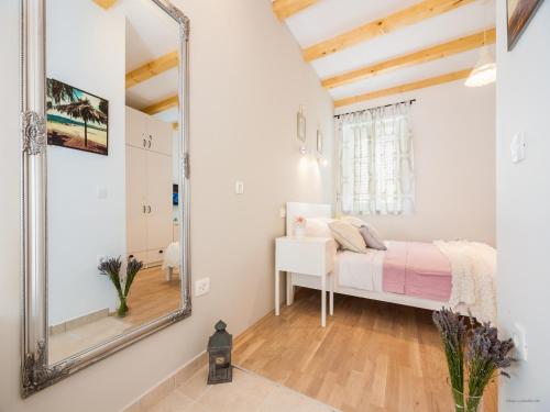 Кровать или кровати в номере Aldo Apartments Center