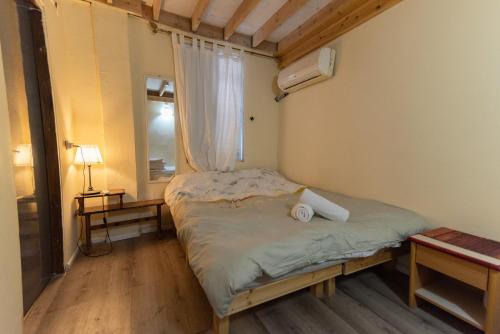 Una cama o camas en una habitación de Spice Quarter Inn