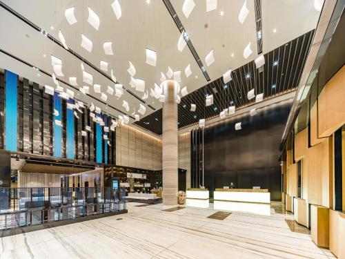 a view of a shopping mall with lights on the ceiling at Atour Hotel Nanjing Xianlin Center Jinying Plaza in Nanjing