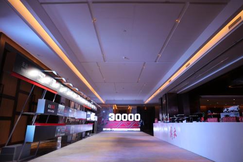 a hallway of a store with a sign on the ceiling at Crowne Plaza Nanning City Center by IHG in Nanning