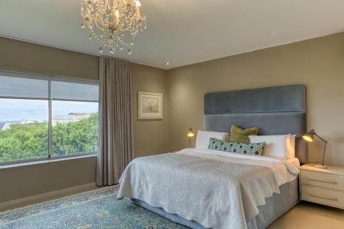 Ένα ή περισσότερα κρεβάτια σε δωμάτιο στο Stanford's Cove Villas