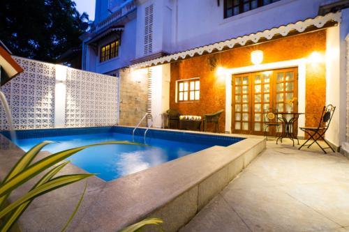 Bazén v ubytování OV Private Pool Villas near Baga, I 4BHK units I Staff nebo v jeho okolí