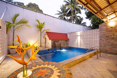 Bazén v ubytování OV Private Pool Villas near Baga, I 4BHK units I Staff nebo v jeho okolí