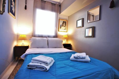 Posteľ alebo postele v izbe v ubytovaní Vintage Apartment