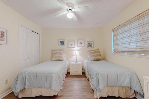 Ένα ή περισσότερα κρεβάτια σε δωμάτιο στο Bay Creek Villa - 205
