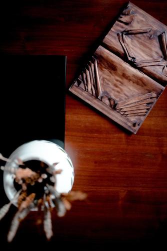 a spider on a table next to a box at Melies Hotel in Kokkinórrakhi