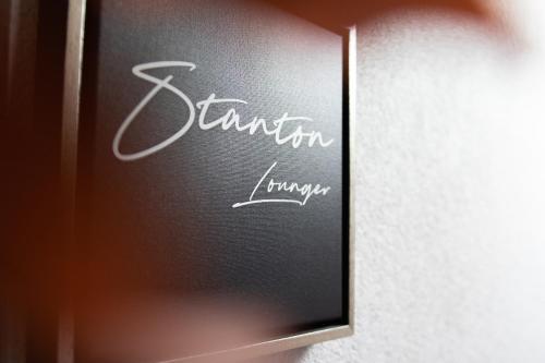 a sign for a wine glass with the name of a restaurant at Luxury Apart Sailers including Premium Summercard in Sankt Anton am Arlberg
