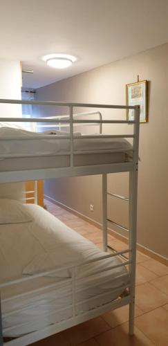 a couple of bunk beds in a room at Presqu'île de Chooz in Chooz