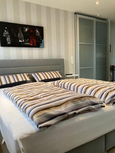 Cama ou camas em um quarto em Ferienwohnung-Christin