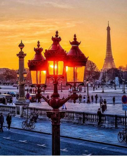 a street light in front of the eiffel tower at Hotel Litteraire Marcel Ayme, BW Premier Collection in Paris