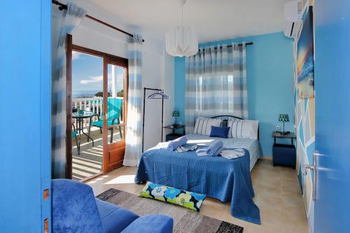 Posteľ alebo postele v izbe v ubytovaní Maras Marinas Home