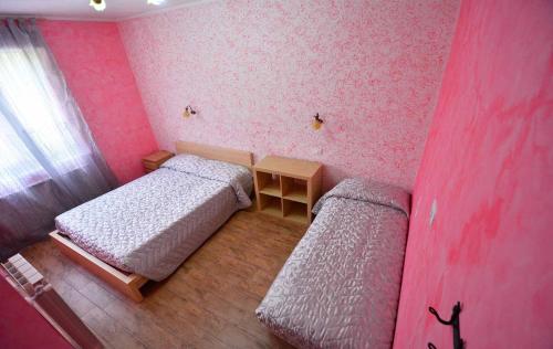 Katil atau katil-katil dalam bilik di B&B Il Casale