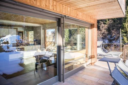 Posezení v ubytování Chalet de Ultimis