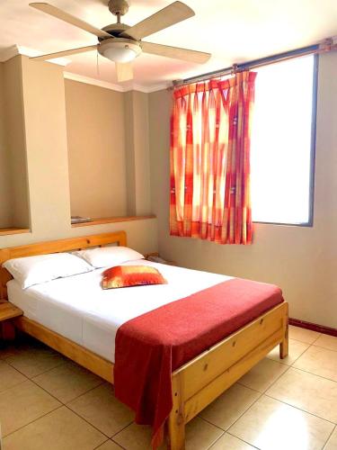 Ένα ή περισσότερα κρεβάτια σε δωμάτιο στο Hostal Quil