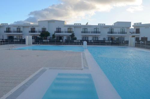 Πισίνα στο ή κοντά στο Apartamento duplex en Complejo de lujo