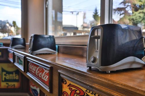 a microwave sitting on top of a counter at Trip Bariloche Select in San Carlos de Bariloche