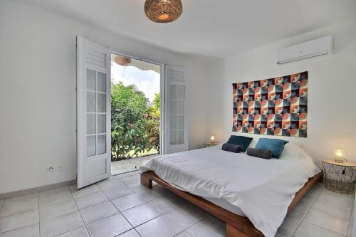 Ένα ή περισσότερα κρεβάτια σε δωμάτιο στο Villa Kaline