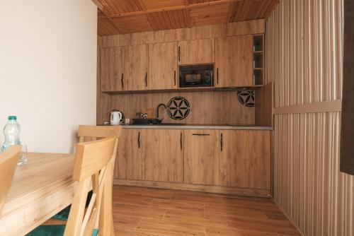 Η κουζίνα ή μικρή κουζίνα στο Apartamenty Grand Tatry - sauna i jacuzzi wliczone w cenę pobytu - 10 minut pieszo od Term Bania