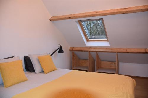 Cama ou camas em um quarto em Le Gîte du Pic Vert