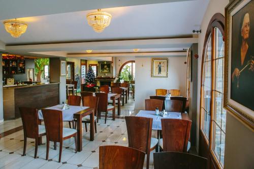 A seating area at Grand Hotel Dentro