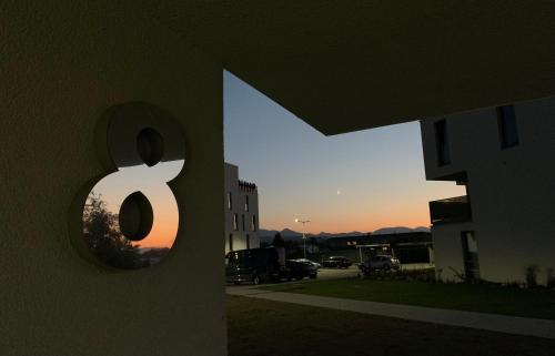 a building with the number eight on the side of it at Apartmán Victory Port in Liptovský Mikuláš