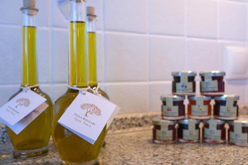 two bottles of wine on a counter with labels on them at Villa Boukari in Chlomós