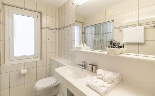 Koupelna v ubytování Grichting Hotel & Serviced Apartments