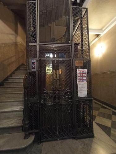 an entrance to a building with a gate at Paradise Rooms - Brignole Station in Genova
