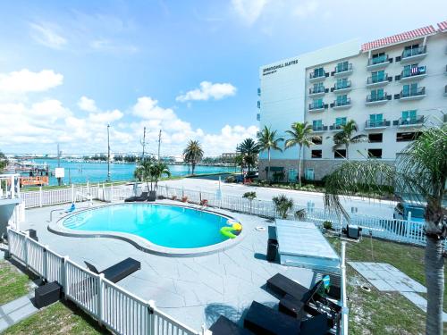 an image of a swimming pool at a hotel at Sunrise Resort Motel South in Clearwater Beach