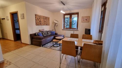 Posezení v ubytování PRESTIGE PARK apartament z tarasem i parkingiem