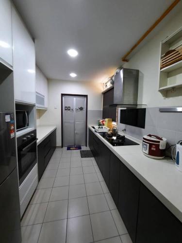 Η κουζίνα ή μικρή κουζίνα στο HillTree Homestay Putrajaya